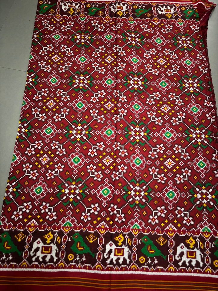 Authentic Double Ikkat Patan Patola Handwoven Pure Silk Saree in Reddish Brown with Navaratna Design and Birds-Elephant Motifs    | SILK MARK CERTIFIED