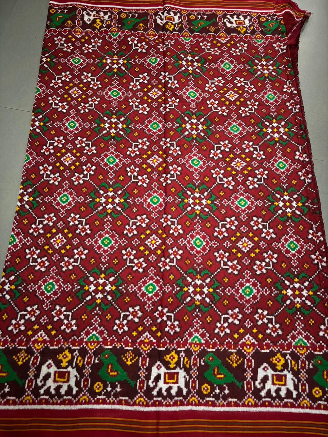 Authentic Double Ikkat Patan Patola Handwoven Pure Silk Saree in Reddish Brown with Navaratna Design and Birds-Elephant Motifs    | SILK MARK CERTIFIED