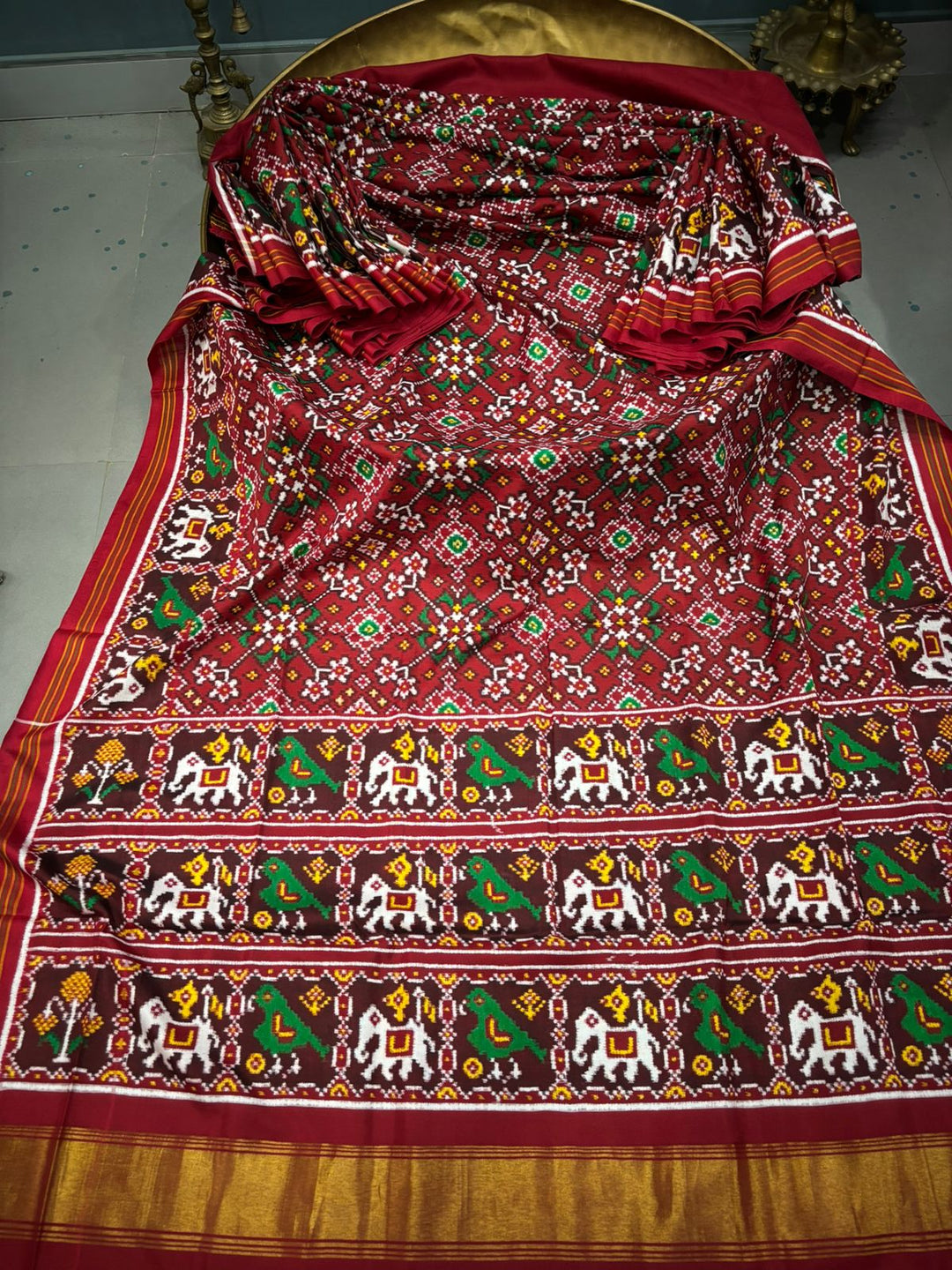 Authentic Double Ikkat Patan Patola Handwoven Pure Silk Saree in Reddish Brown with Navaratna Design and Birds-Elephant Motifs    | SILK MARK CERTIFIED