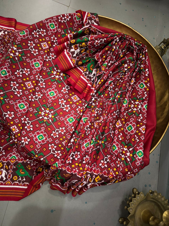 Authentic Double Ikkat Patan Patola Handwoven Pure Silk Saree in Reddish Brown with Navaratna Design and Birds-Elephant Motifs    | SILK MARK CERTIFIED