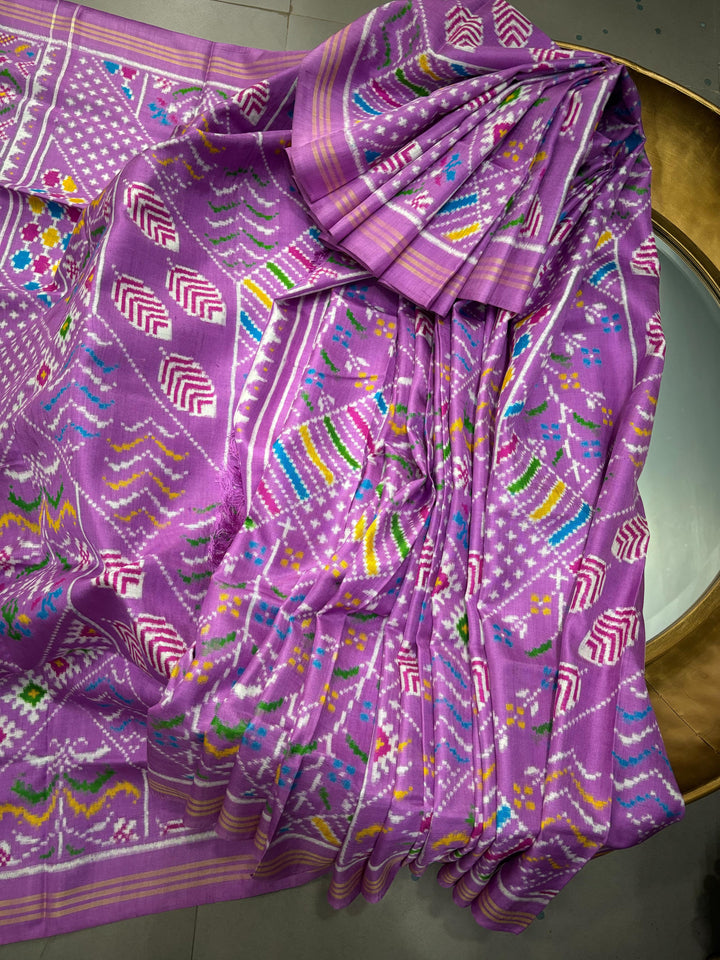Authentic Double Ikkat Patan Patola Handwoven Pure Silk  Saree in Lilac with Persian Floral Design | SILK MARK CERTIFIED | SHOBITAM