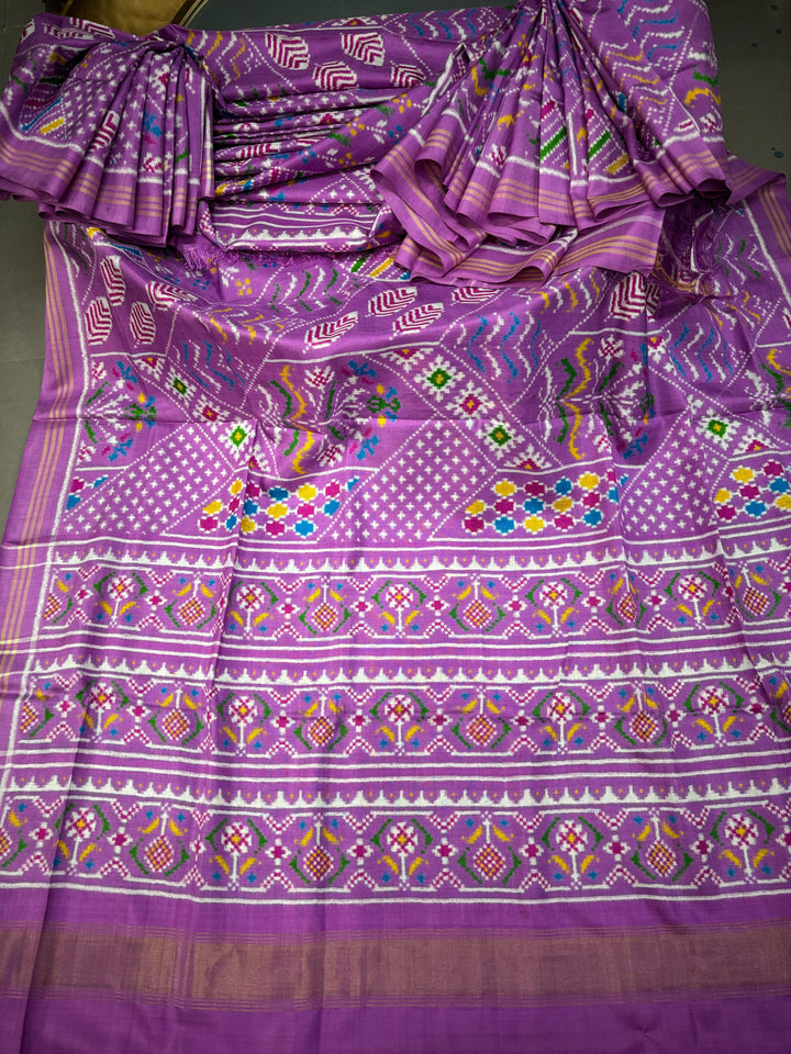 Authentic Double Ikkat Patan Patola Handwoven Pure Silk  Saree in Lilac with Persian Floral Design | SILK MARK CERTIFIED | SHOBITAM