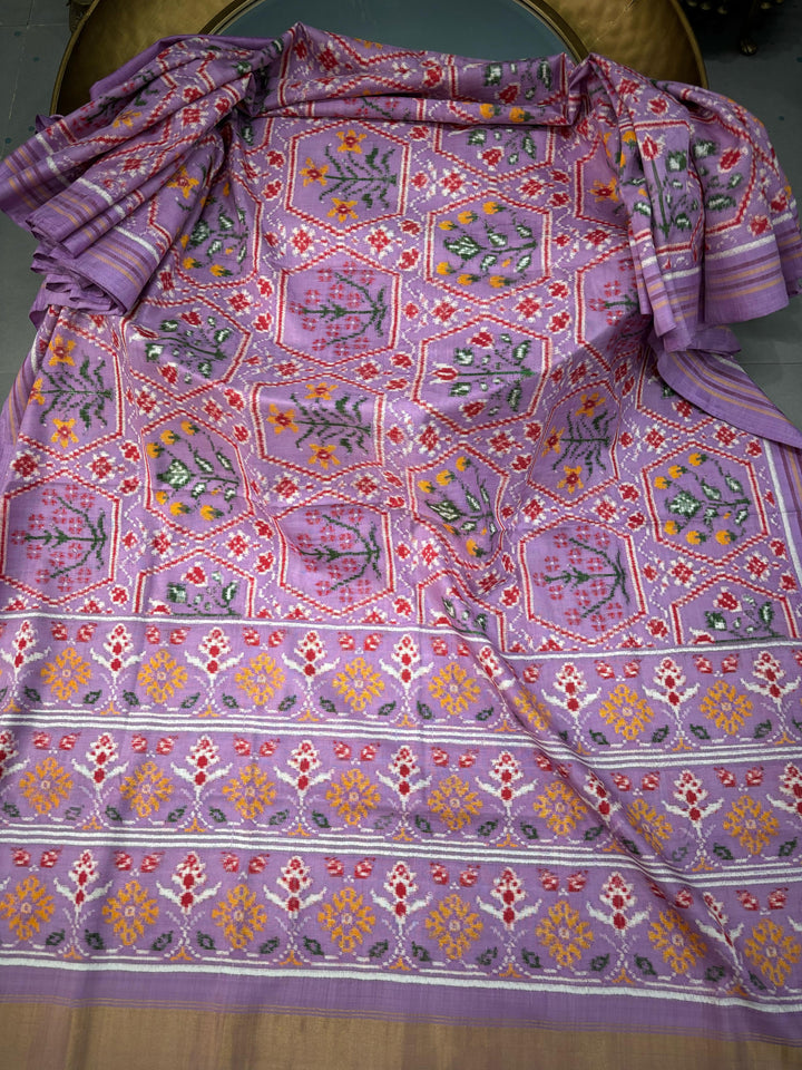 Authentic Double Ikkat Patan Patola Handwoven Pure Silk  Saree in Lilac with Persian Floral Design | SILK MARK CERTIFIED | SHOBITAM