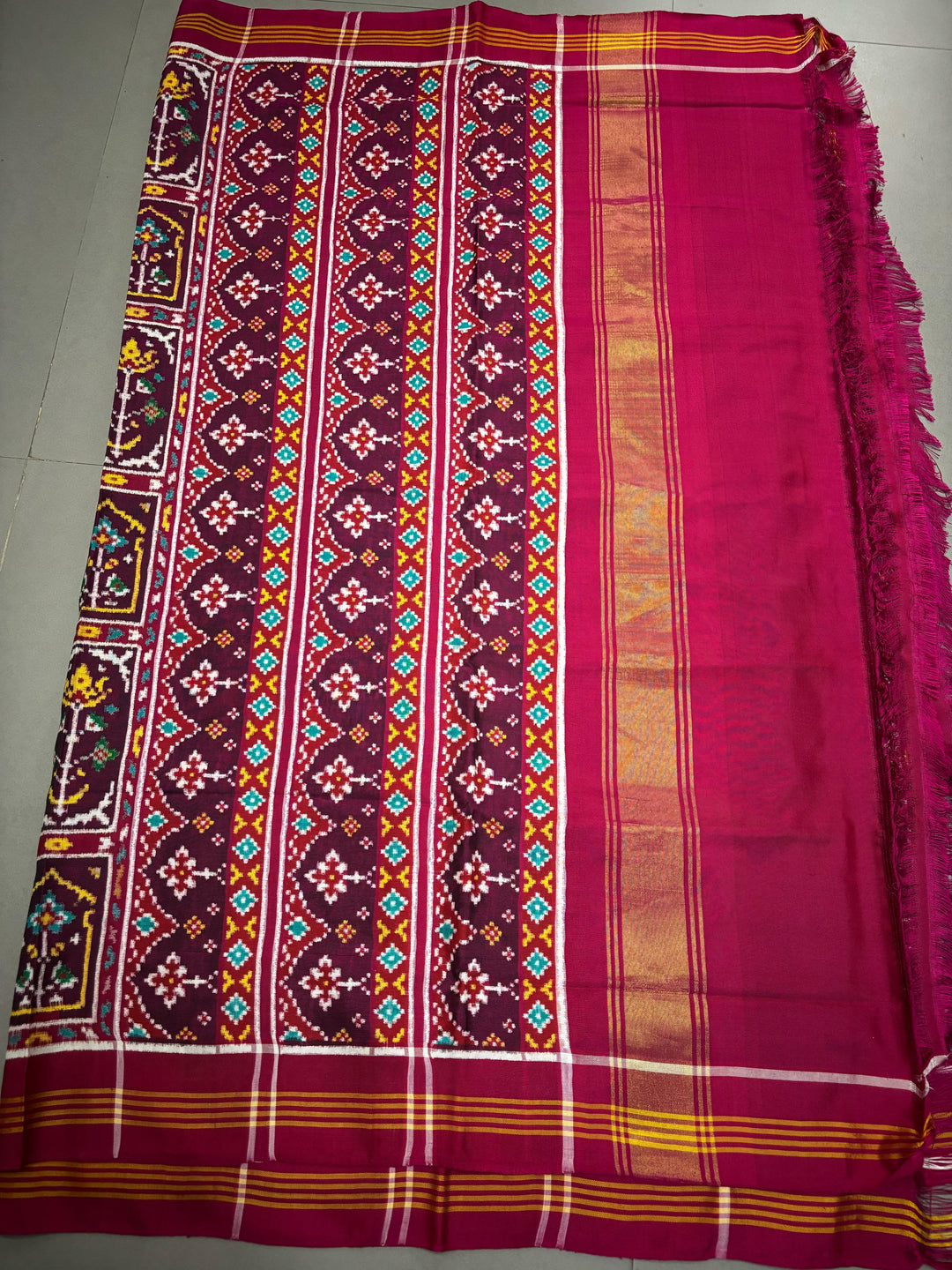 Authentic Double Ikkat Patan Patola Pure Silk Handwoven  Saree in Deep Plum with Persian Arches Floral Motifs Design | SILK MARK CERTIFIED