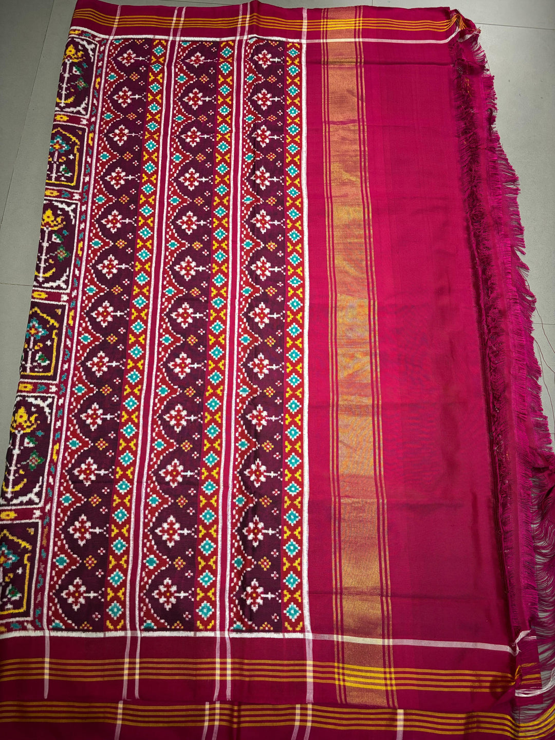Authentic Double Ikkat Patan Patola Pure Silk Handwoven  Saree in Deep Plum with Persian Arches Floral Motifs Design | SILK MARK CERTIFIED
