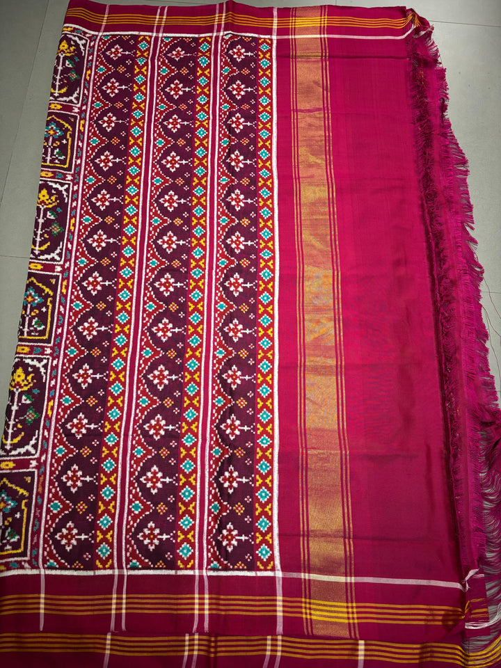 Authentic Double Ikkat Patan Patola Pure Silk Handwoven  Saree in Deep Plum with Persian Arches Floral Motifs Design | SILK MARK CERTIFIED