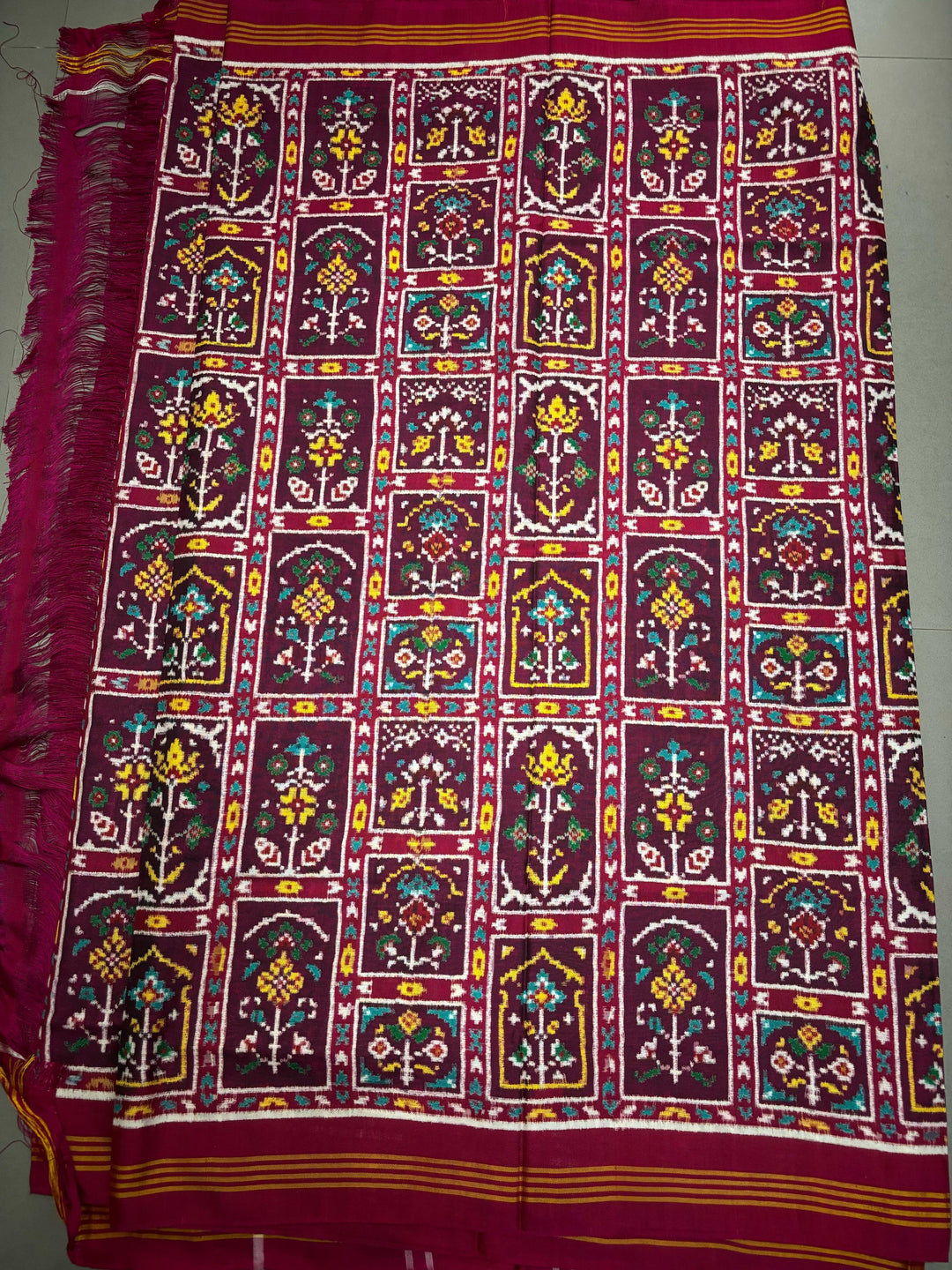 Authentic Double Ikkat Patan Patola Pure Silk Handwoven  Saree in Deep Plum with Persian Arches Floral Motifs Design | SILK MARK CERTIFIED
