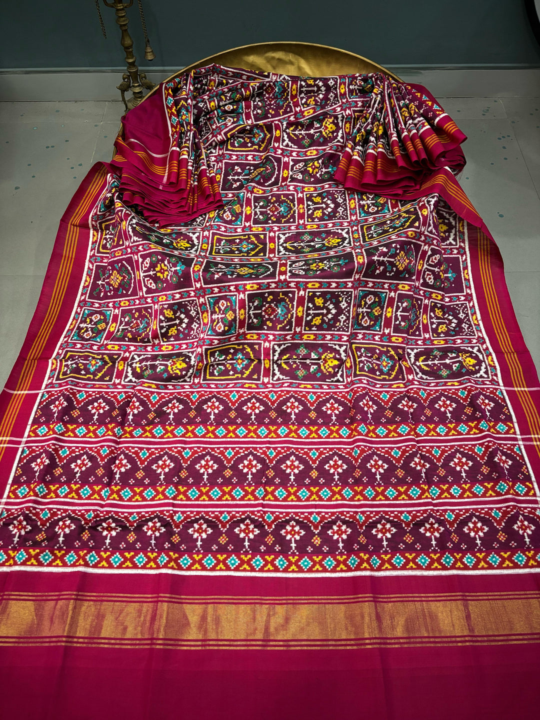 Authentic Double Ikkat Patan Patola Pure Silk Handwoven  Saree in Deep Plum with Persian Arches Floral Motifs Design | SILK MARK CERTIFIED