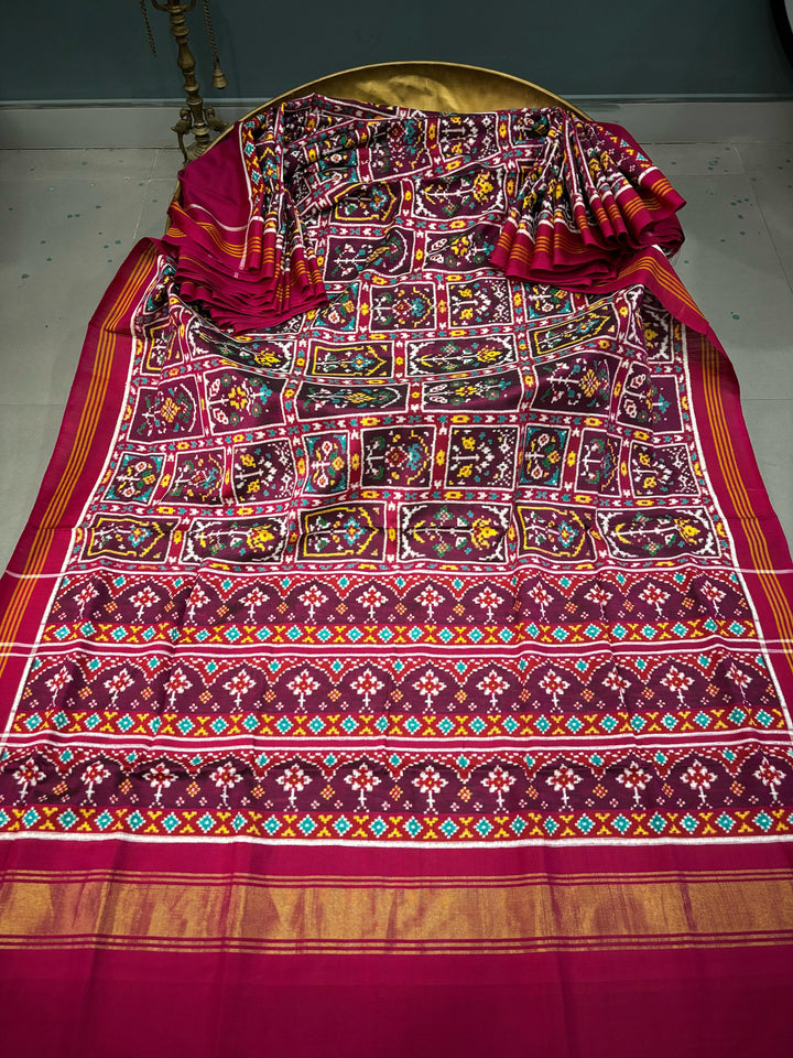 Authentic Double Ikkat Patan Patola Pure Silk Handwoven  Saree in Deep Plum with Persian Arches Floral Motifs Design | SILK MARK CERTIFIED