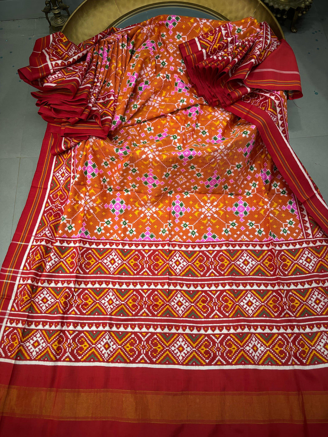 Authentic Double Ikkat Patan Patola Pure Silk Handwoven  Saree in Rust Orange with Navaratna Design | SILK MARK CERTIFIED