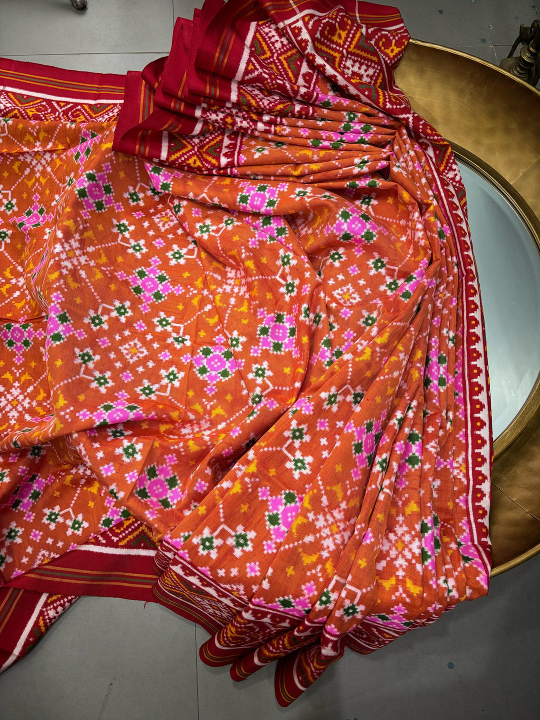 Authentic Double Ikkat Patan Patola Pure Silk Handwoven  Saree in Rust Orange with Navaratna Design | SILK MARK CERTIFIED
