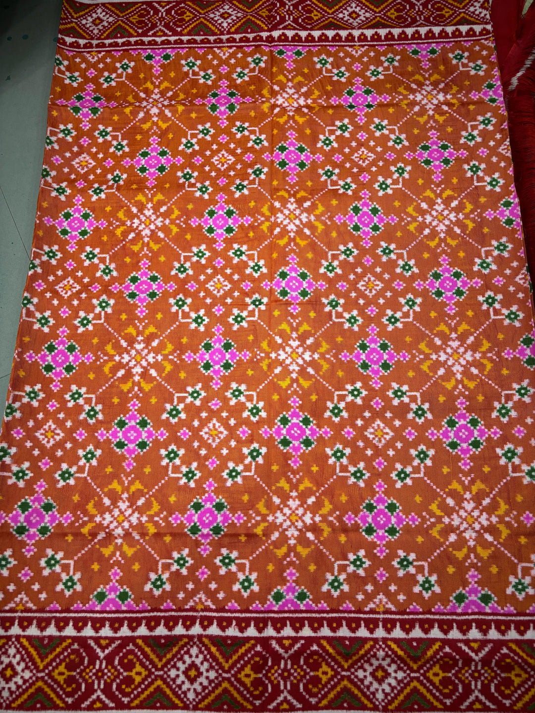 Authentic Double Ikkat Patan Patola Pure Silk Handwoven  Saree in Rust Orange with Navaratna Design | SILK MARK CERTIFIED