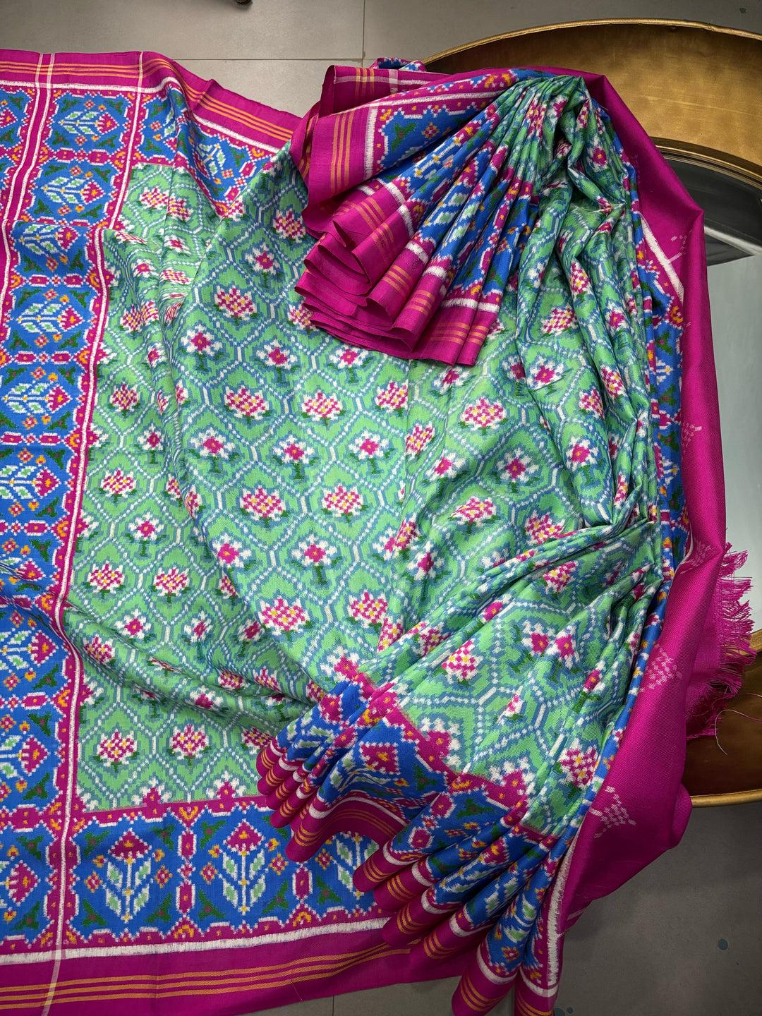 Authentic Double Ikkat Patan Patola Pure Silk Handwoven  Saree in Mint Green with Anar Buttas and Contrast Border | SILK MARK CERTIFIED | SHOBITAM