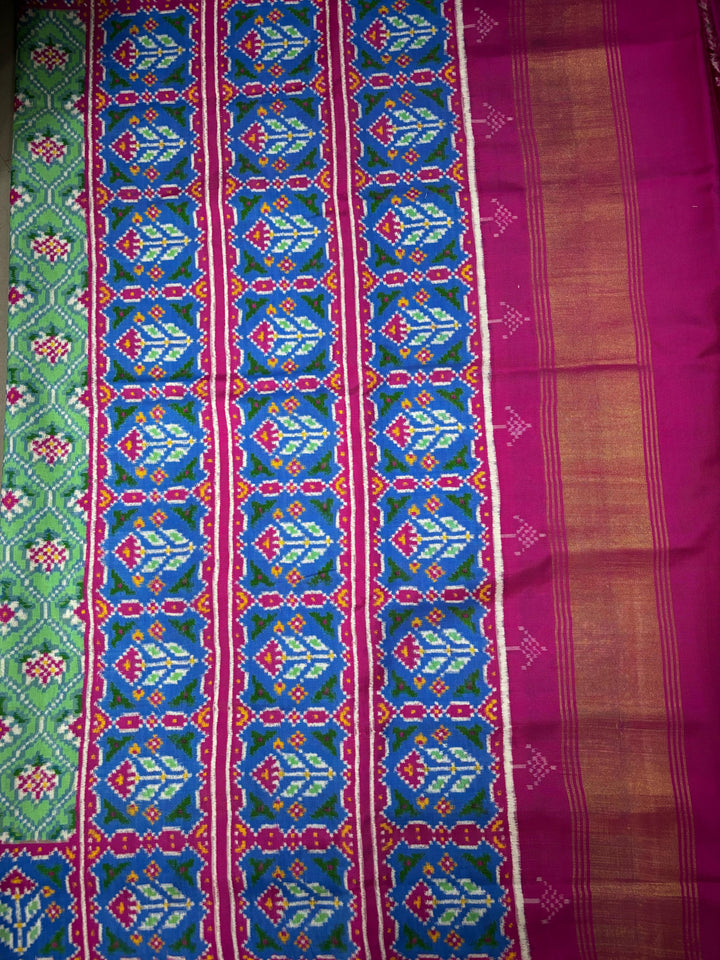 Authentic Double Ikkat Patan Patola Pure Silk Handwoven  Saree in Mint Green with Anar Buttas and Contrast Border | SILK MARK CERTIFIED | SHOBITAM