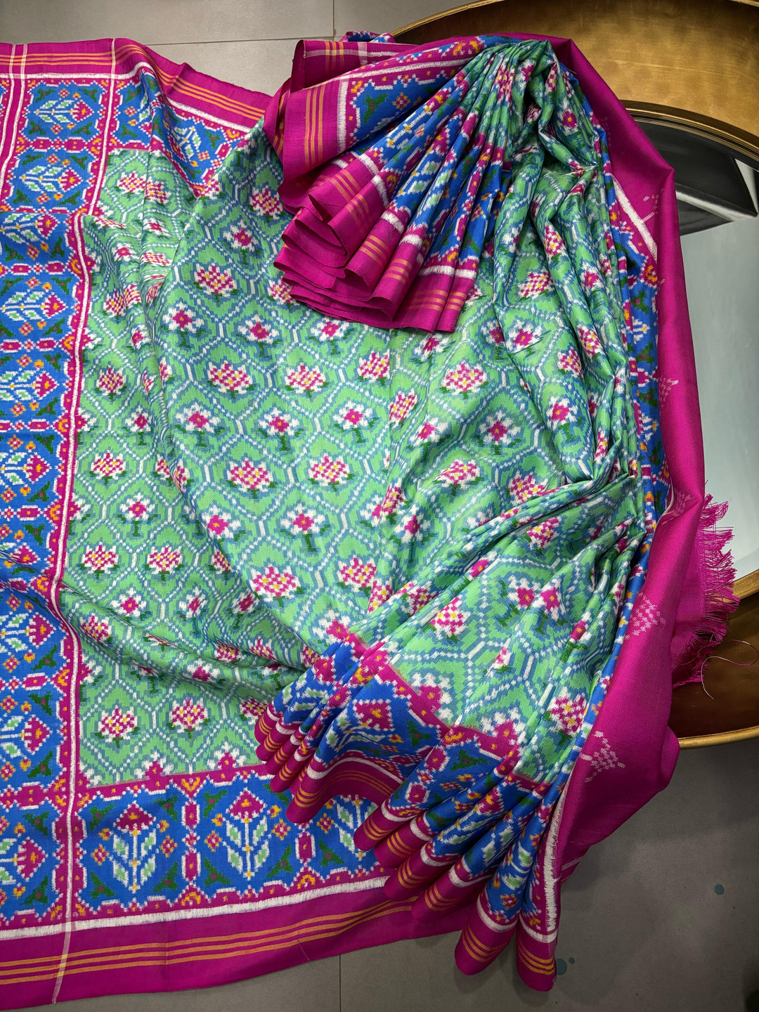 Authentic Double Ikkat Patan Patola Pure Silk Handwoven  Saree in Mint Green with Anar Buttas and Contrast Border | SILK MARK CERTIFIED | SHOBITAM