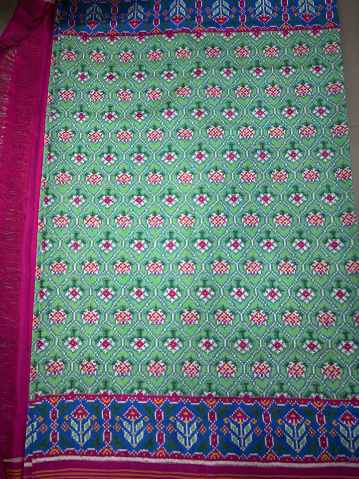 Authentic Double Ikkat Patan Patola Pure Silk Handwoven  Saree in Mint Green with Anar Buttas and Contrast Border | SILK MARK CERTIFIED | SHOBITAM