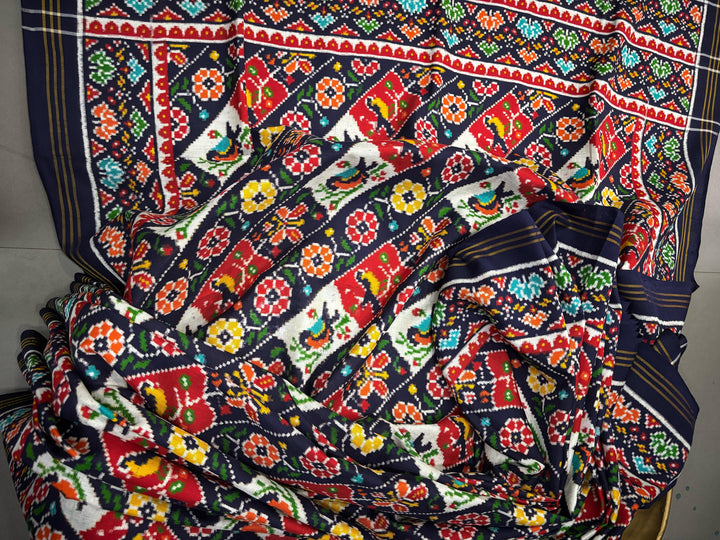 Authentic Double Ikkat Patan Patola Pure Silk Handwoven  Saree in Blackish Blue with Leheria Design | SILK MARK CERTIFIED | SHOBITAM