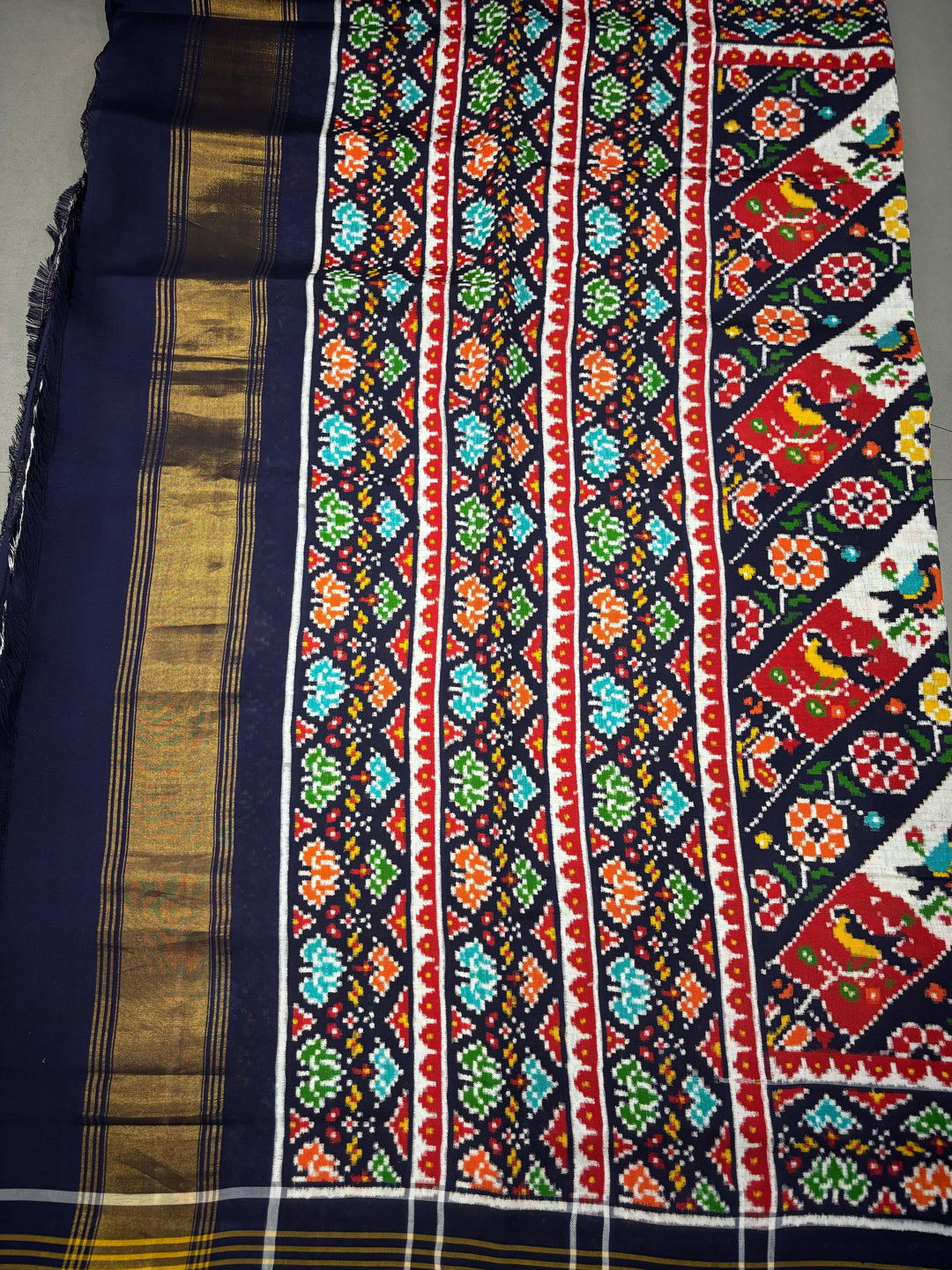 Authentic Double Ikkat Patan Patola Pure Silk Handwoven  Saree in Blackish Blue with Leheria Design | SILK MARK CERTIFIED | SHOBITAM