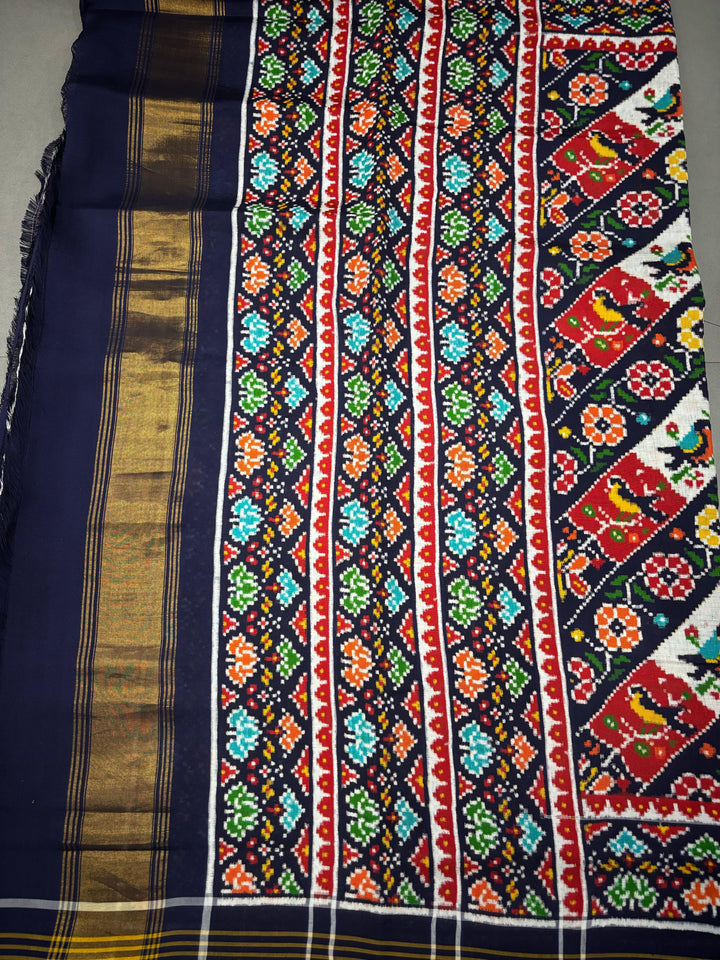Authentic Double Ikkat Patan Patola Pure Silk Handwoven  Saree in Blackish Blue with Leheria Design | SILK MARK CERTIFIED | SHOBITAM
