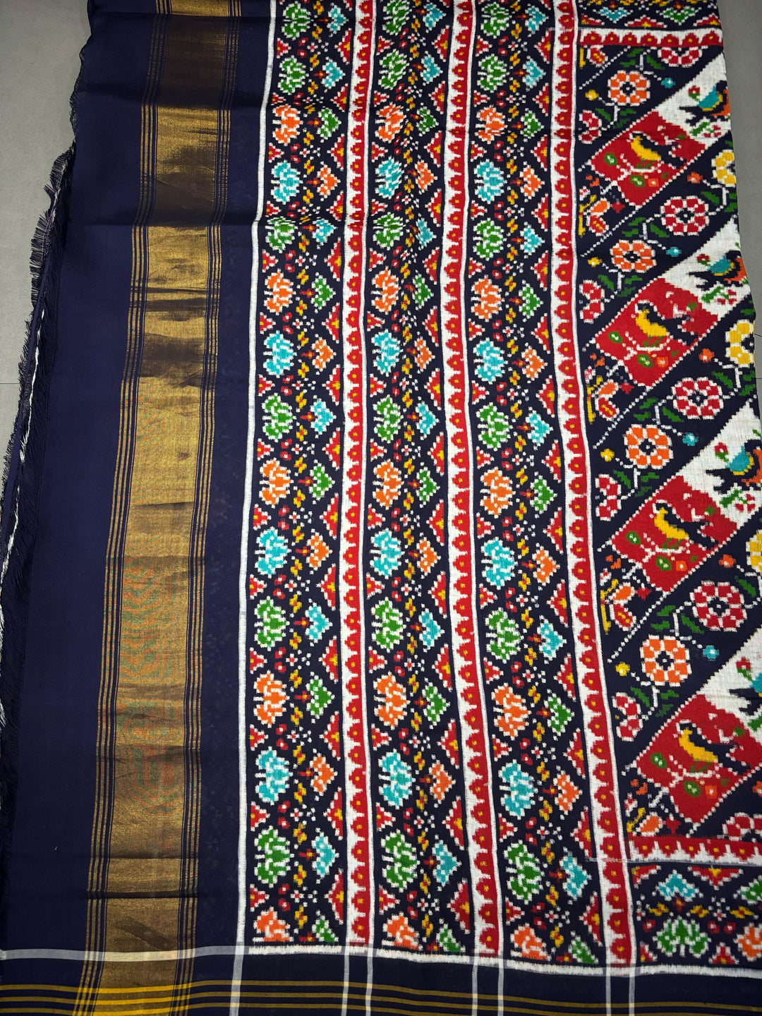 Authentic Double Ikkat Patan Patola Pure Silk Handwoven  Saree in Blackish Blue with Leheria Design | SILK MARK CERTIFIED | SHOBITAM