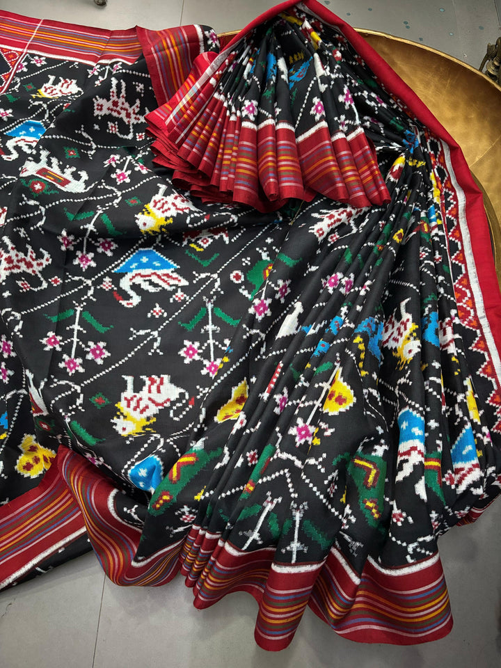 Authentic Double Ikkat Patan Patola Pure Silk Handwoven Patli Pallu Saree in Black with Leheria Design and Birds-Butterflies-Elephant | SILK MARK CERTIFIED