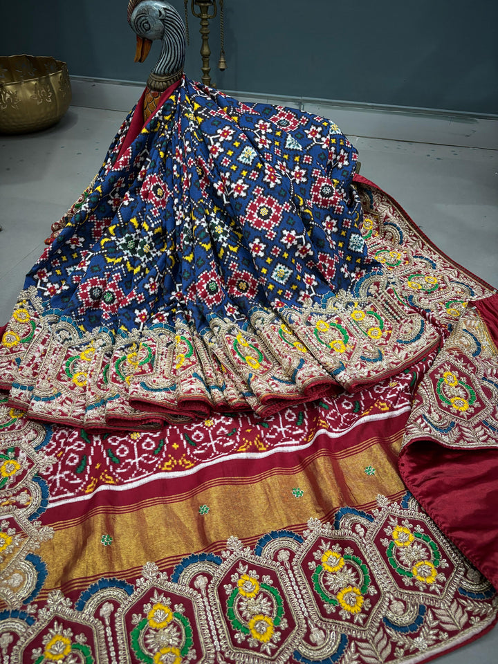 Authentic Double Ikkat Patan Patola Pure Silk Handwoven  Saree in Prussian Blue with Navarathna Design and Meenakari Zardosi Hand Work | SILK MARK CERTIFIED