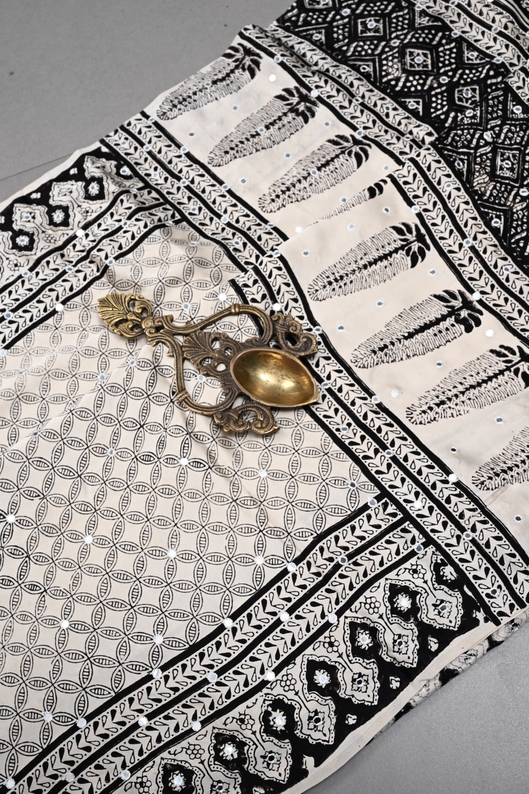 Off-White Hand Block Print on Modal Silk Saree with Hand Embellished Tikki Work  | SHOBITAM