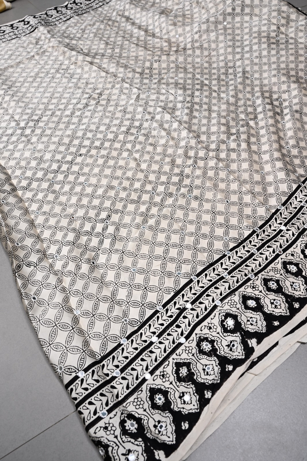 Off-White Hand Block Print on Modal Silk Saree with Hand Embellished Tikki Work  | SHOBITAM