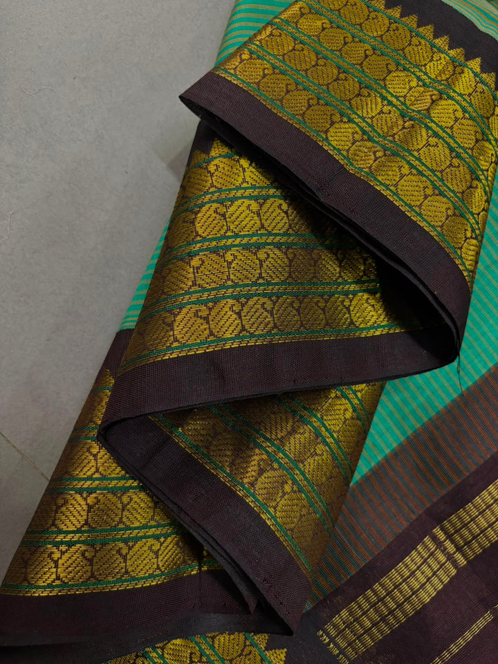 Sea Green Kanchi Silk Cotton Handloom Saree with Horizontal Stripes and Contrast Zari Border | SHOBITAM