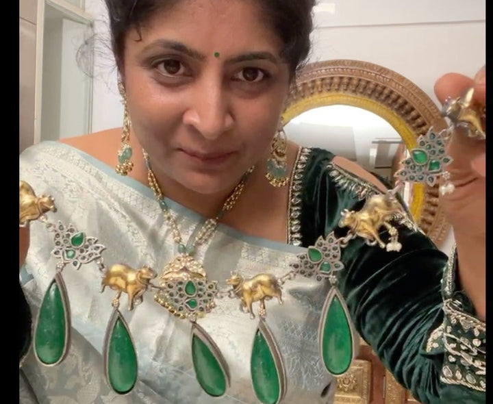 Fusion Dual Tone Jewelry with Pichwai Cow units and Green stones | Shobitam Jewelry