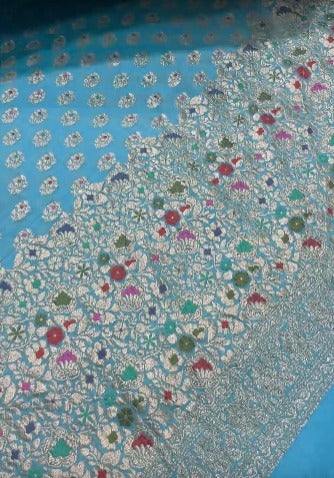Authentic Turquoise Meenakari Work on Banarasi Silk Georgette Saree with Floral Buttas and 2 Side Equal Ornate Skirt Border | SILK MARK CERTIFIED