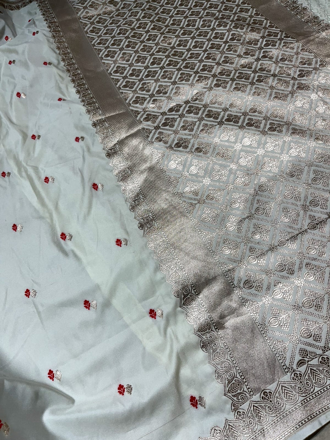 White Semi Mashru Banarasi Silk Saree with Dainty Meenakari Work and Minimal Zari Border