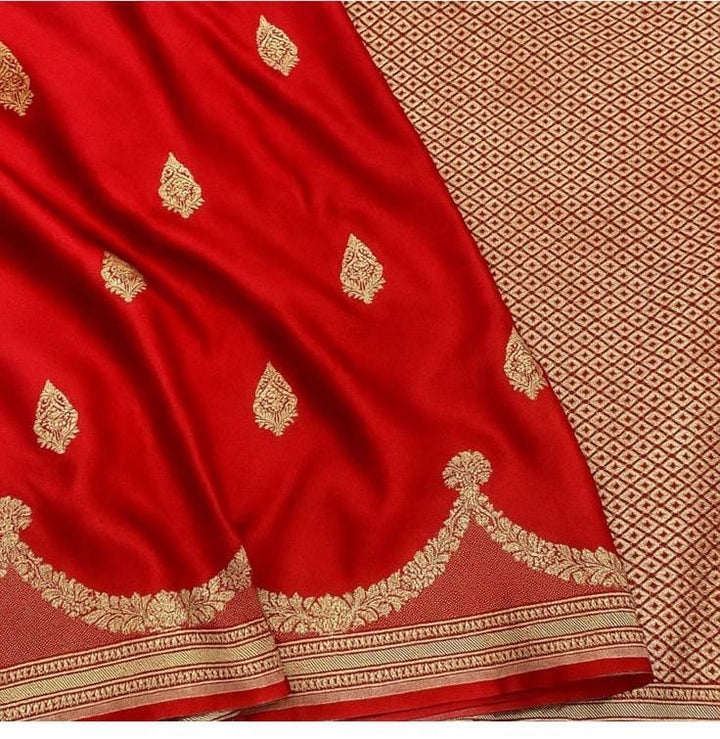 Vibrant Red Orange Banarasi Semi mashru Silk Saree with Butidar Zari Buttas and Scalloped Border