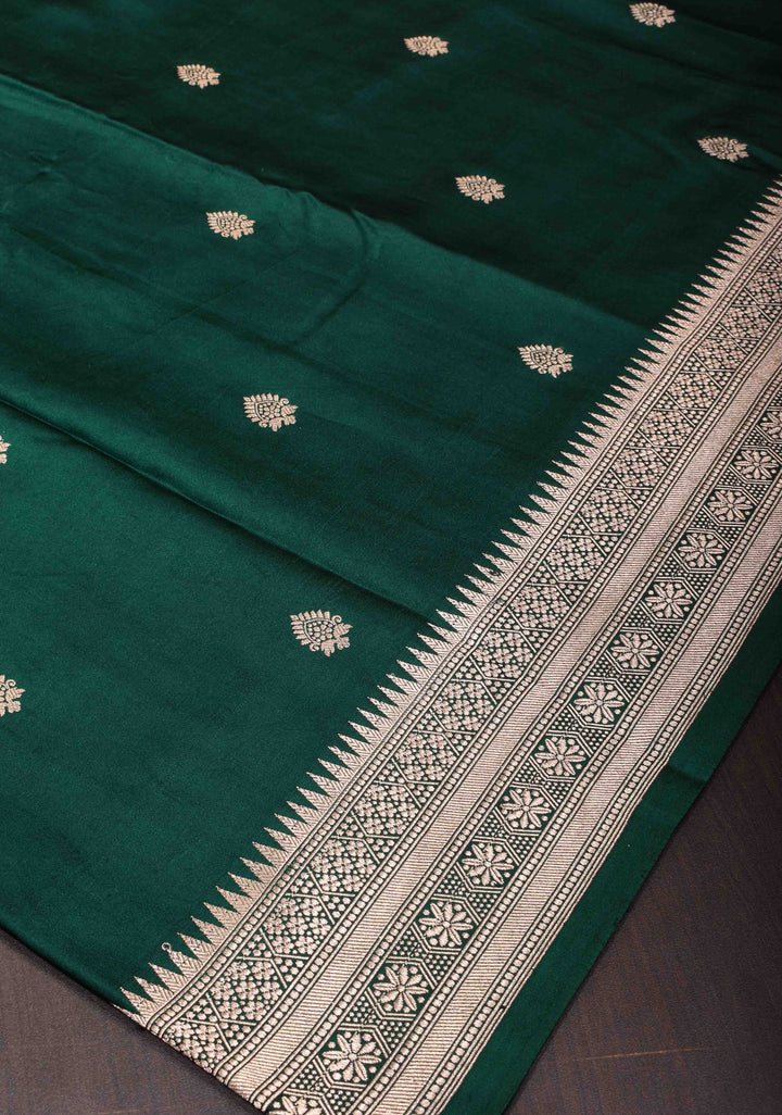 Exquisite Bottle Green Banarasi Mashru Silk Saree with Floral Buttas and zari Border | SILK MARK CERTIFIED