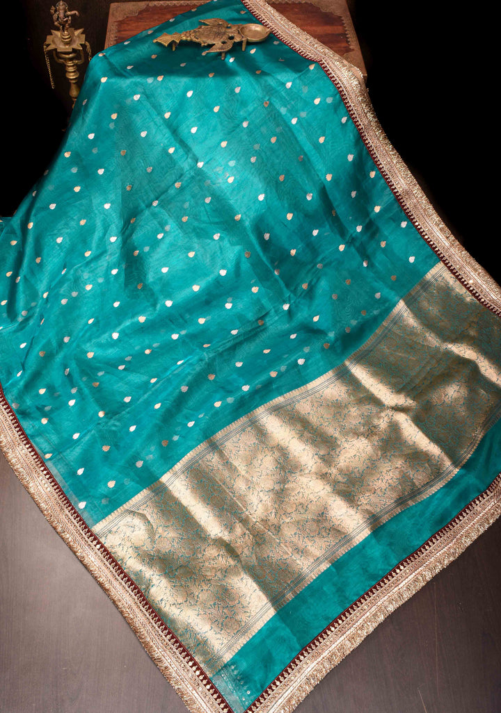 Peacock Blue Banarasi Tissue Handloom Saree with Dainty Sona Rupa Kadhuwa Buttas and Fancy Lace Border | SILK MARK CERTIFIED | SHOBITAM
