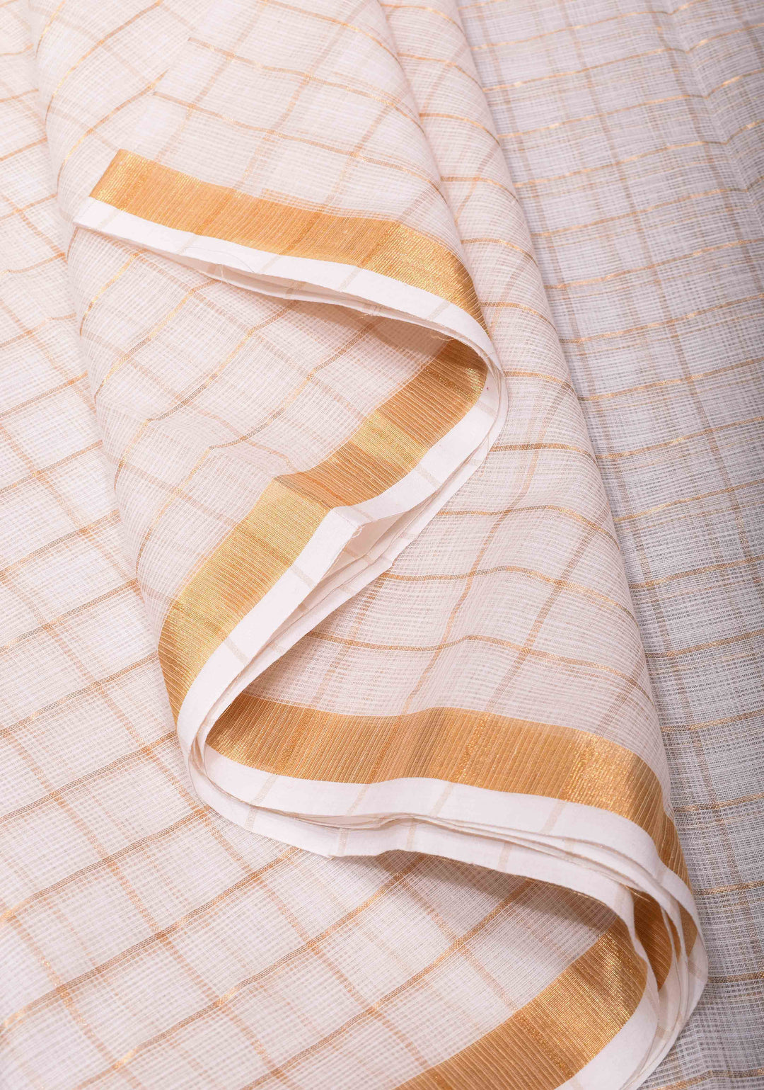 White Kota Doria Cotton Saree with Checks Pattern and Minimal Zari Border