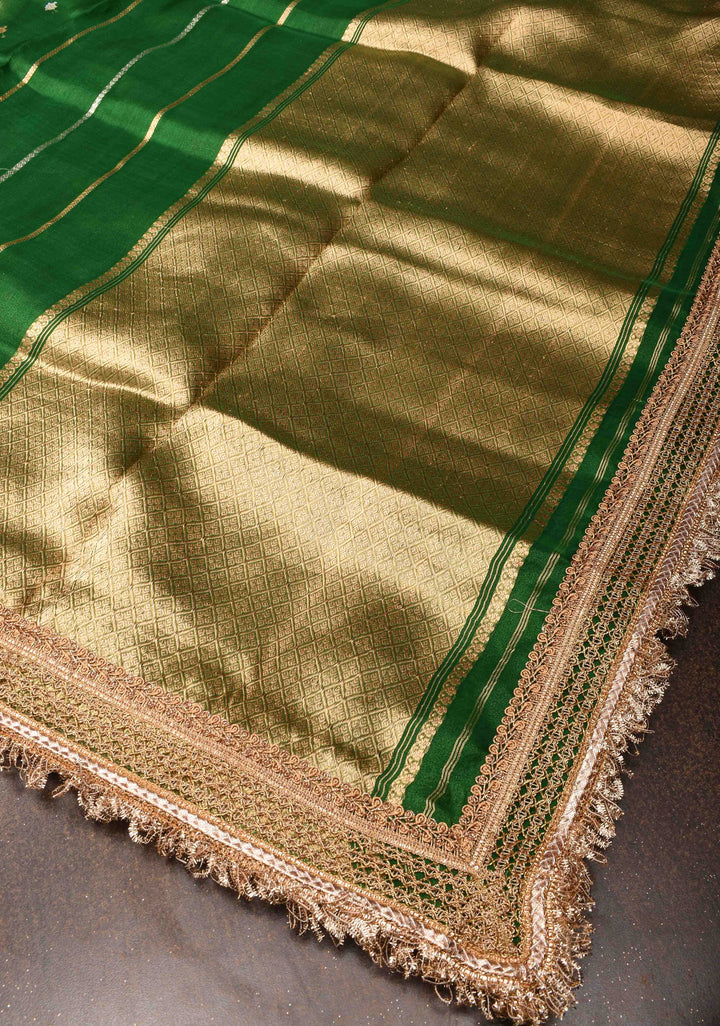 Bottle Green Banarasi Tissue Handloom Saree with Sona Rupa Buttis and Lace Border | SILK MARK CERTIFIED