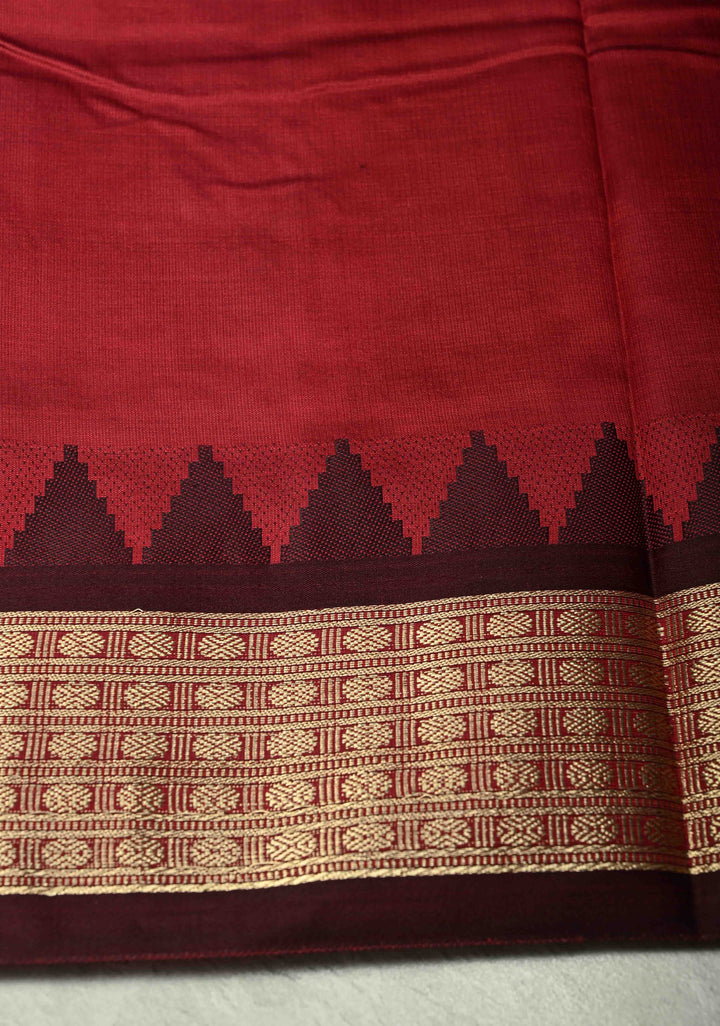 Dark Green Semi Silk Saree with Floral Buttas and Temple Zari Border