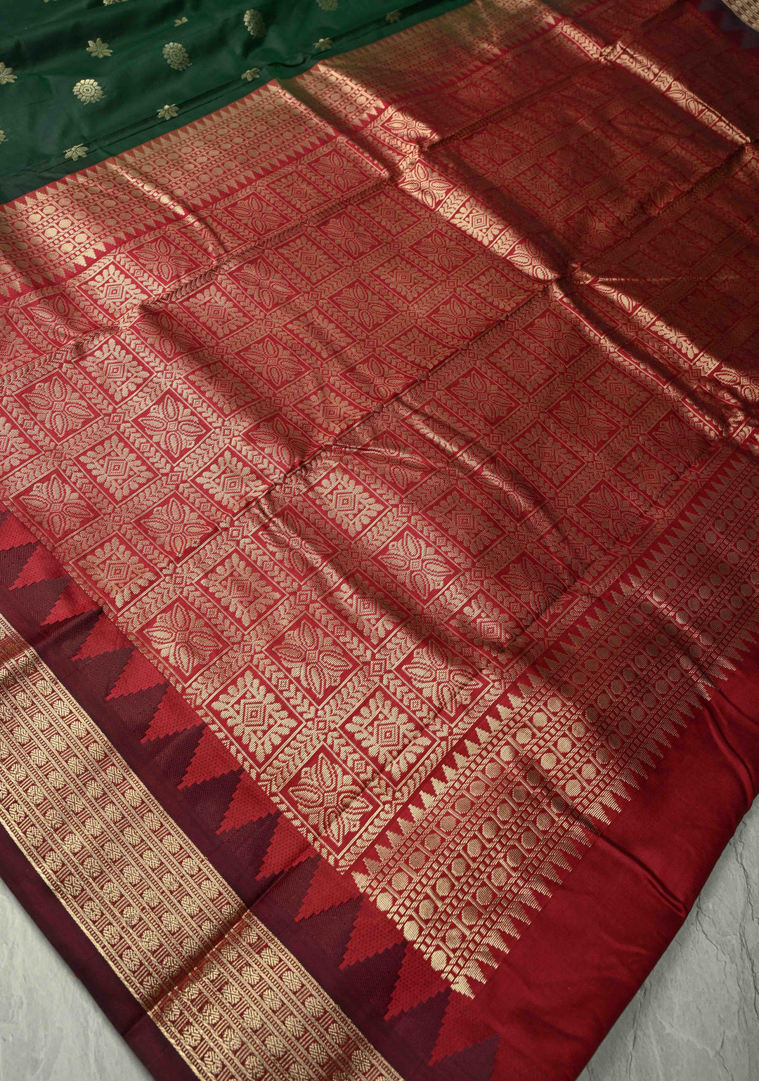 Dark Green Semi Silk Saree with Floral Buttas and Temple Zari Border