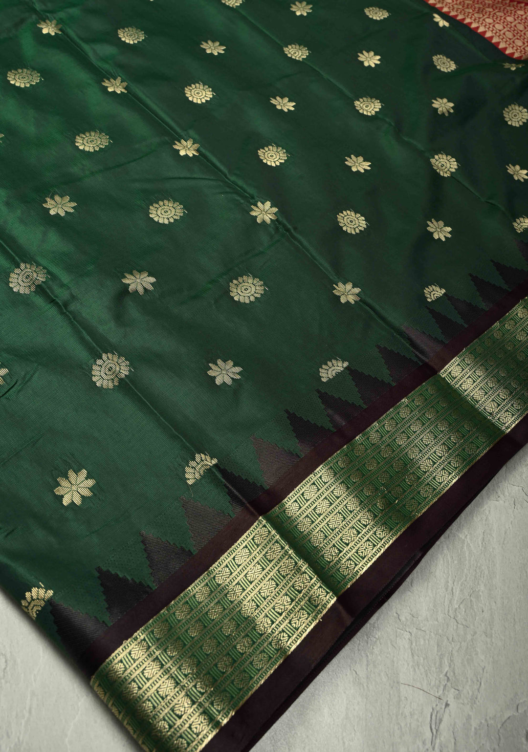 Dark Green Semi Silk Saree with Floral Buttas and Temple Zari Border
