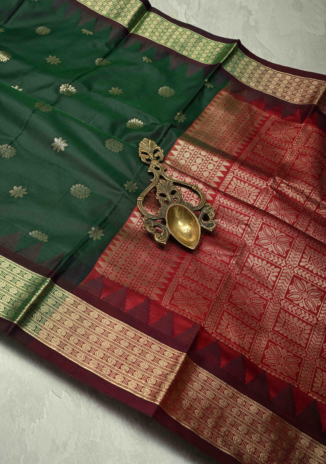 Dark Green Semi Silk Saree with Floral Buttas and Temple Zari Border