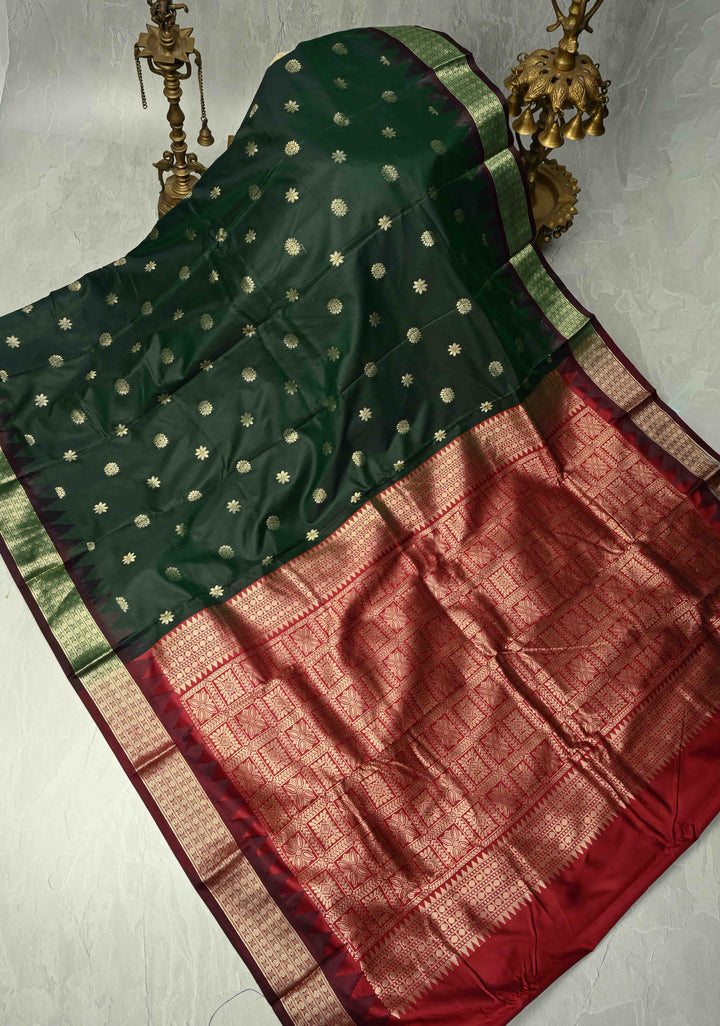 Dark Green Semi Silk Saree with Floral Buttas and Temple Zari Border