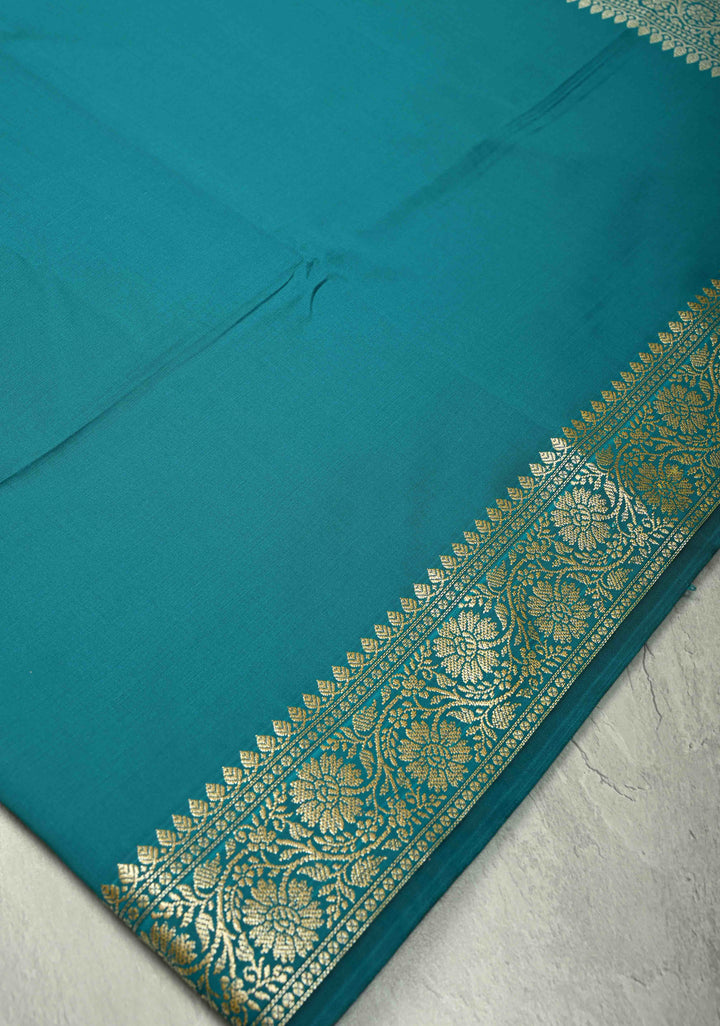 Persian Green Semi Silk Saree with Floral Zari Border and Brocade Blouse Piece