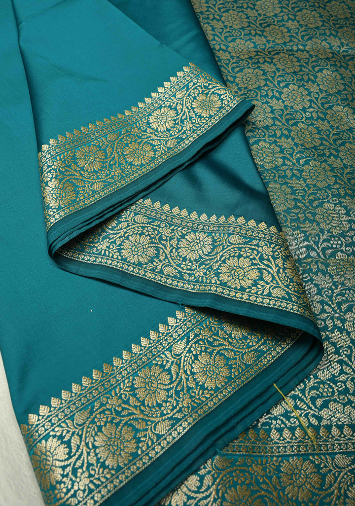 Persian Green Semi Silk Saree with Floral Zari Border and Brocade Blouse Piece