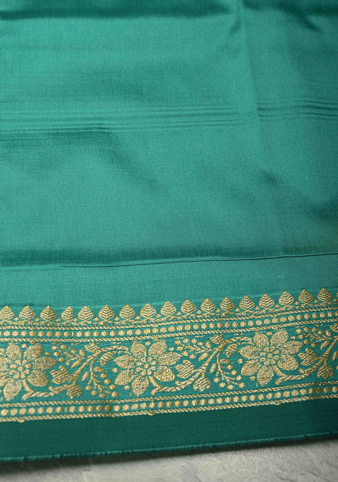 Dark Mint Semi Silk Saree with Chunri Buttis and Minimal Zari Border