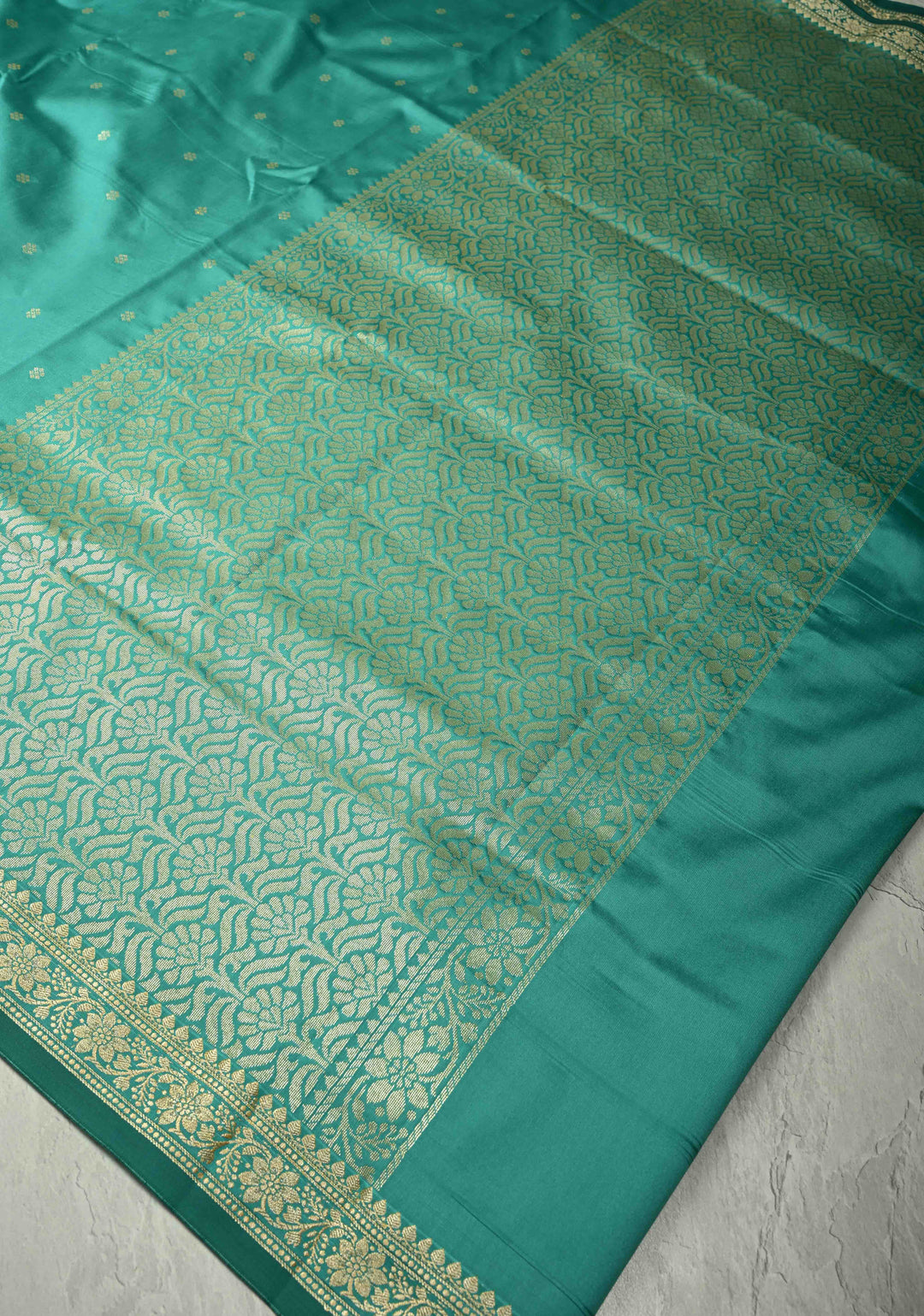 Dark Mint Semi Silk Saree with Chunri Buttis and Minimal Zari Border
