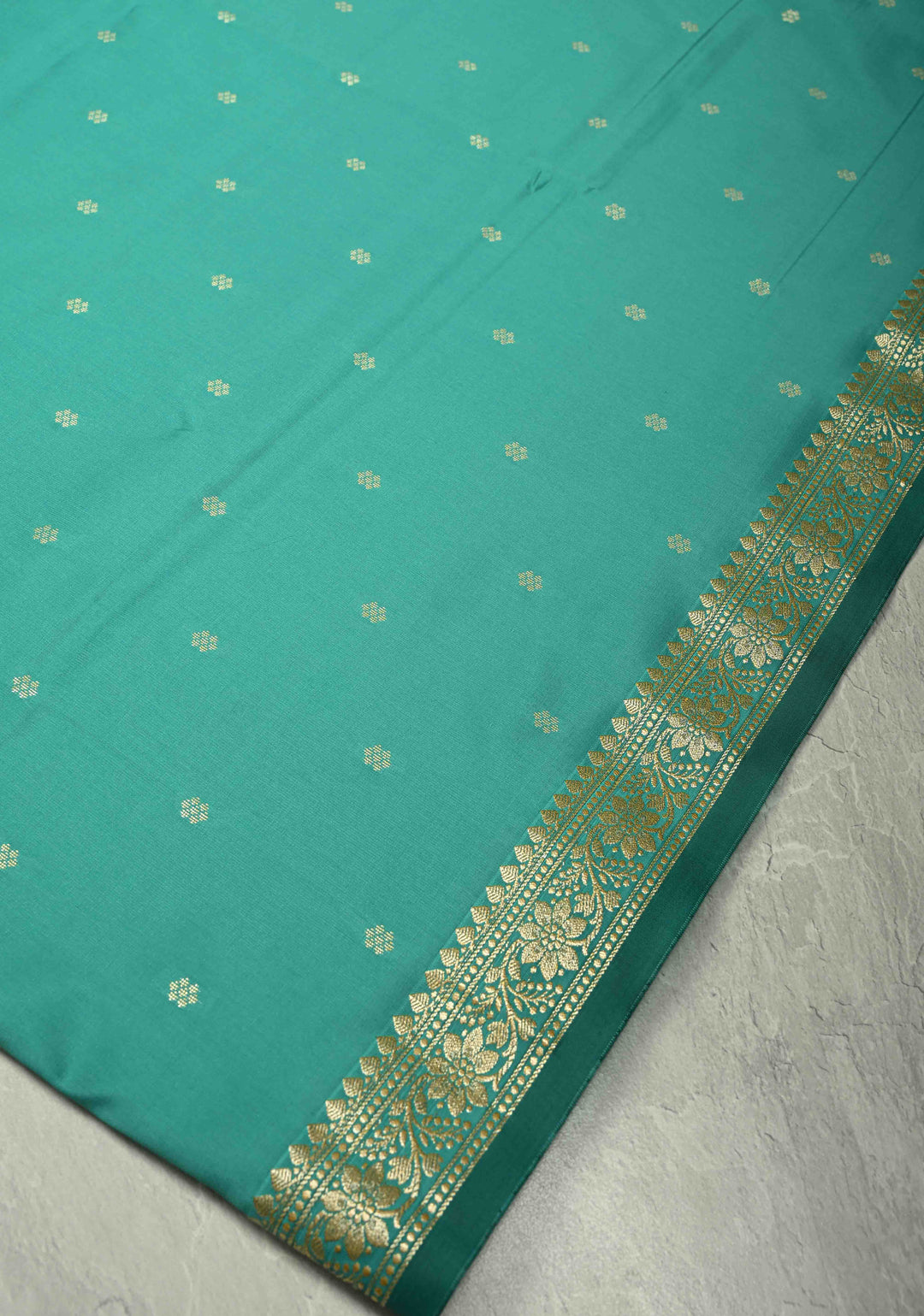 Dark Mint Semi Silk Saree with Chunri Buttis and Minimal Zari Border