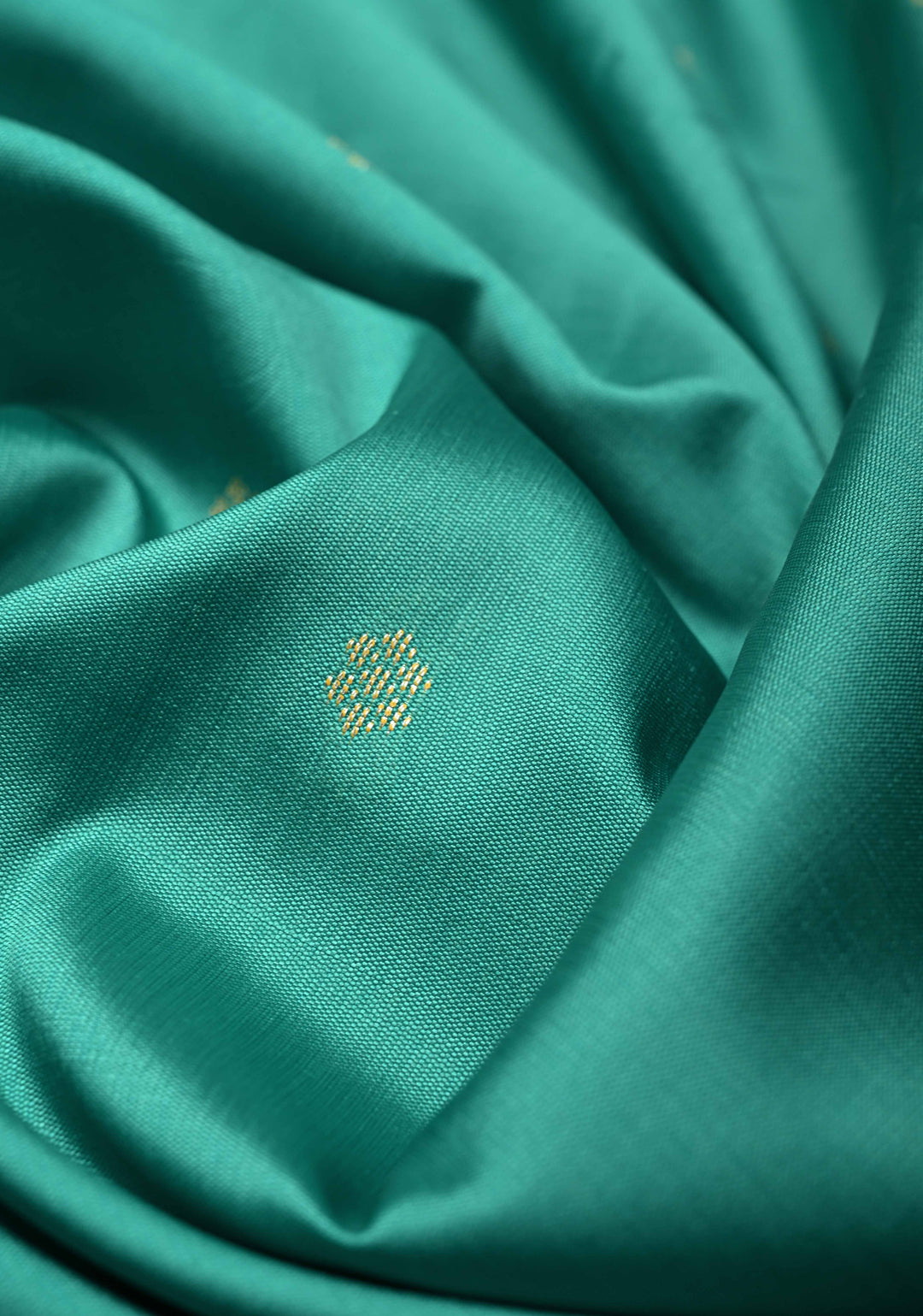 Dark Mint Semi Silk Saree with Chunri Buttis and Minimal Zari Border