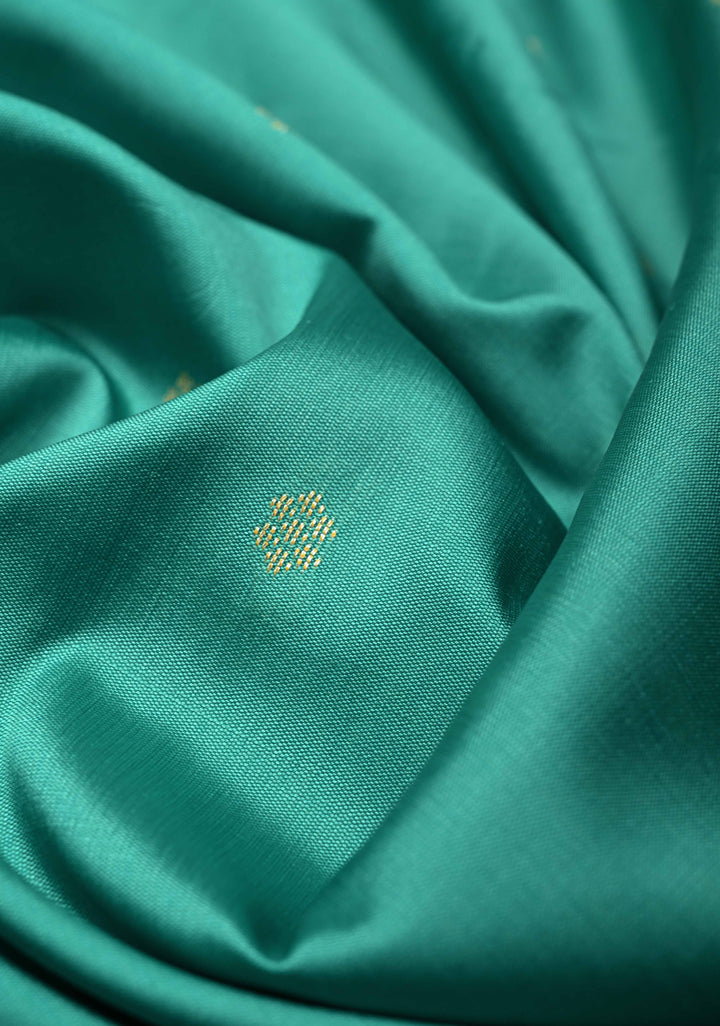 Dark Mint Semi Silk Saree with Chunri Buttis and Minimal Zari Border