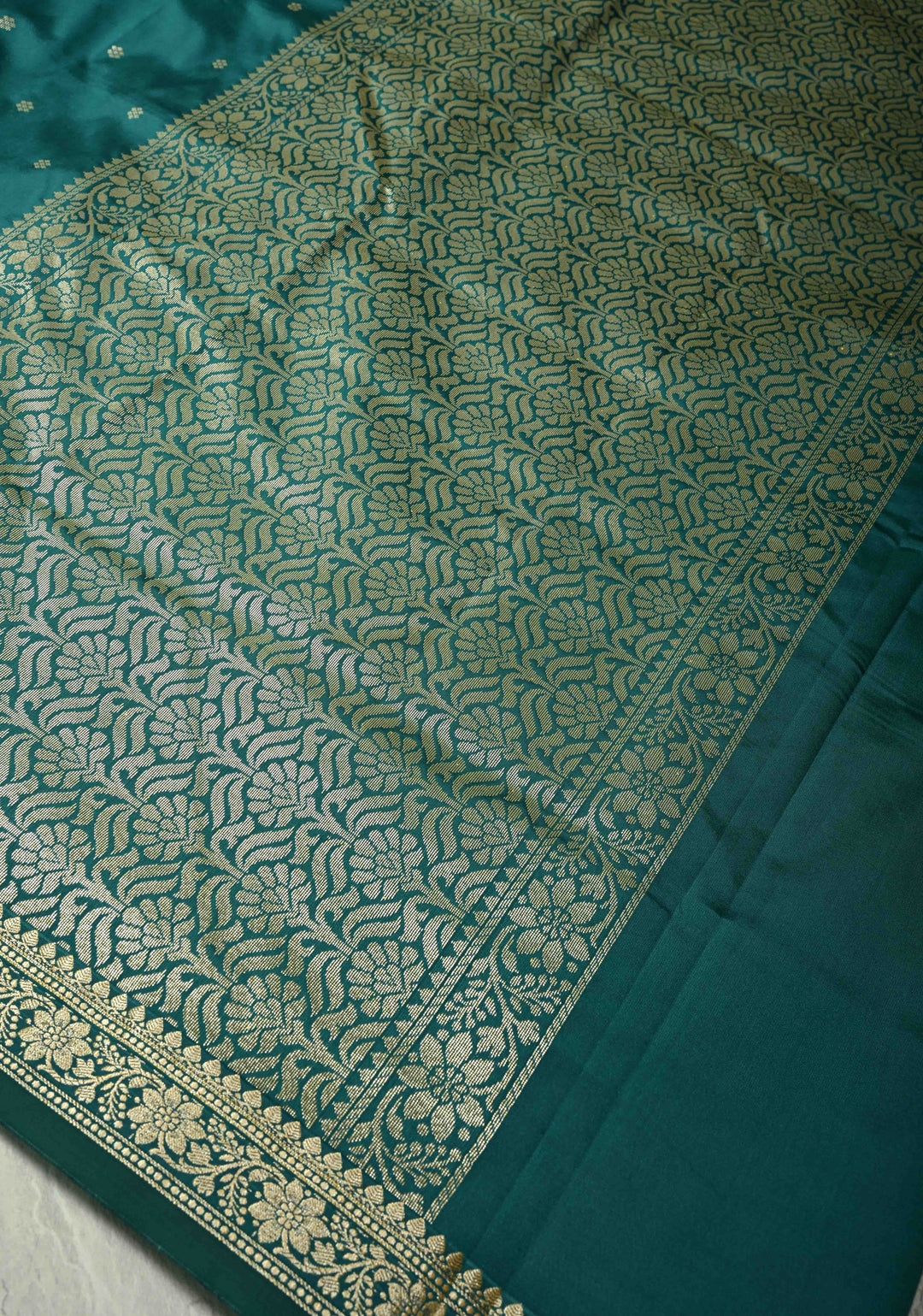 Dark Teal Semi Silk Saree with Chunri Buttis and Minimal Zari Border